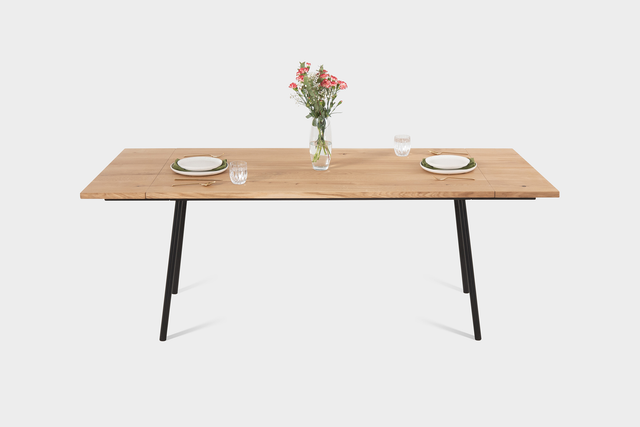 walnut dining table and bench on steel legs with woman and child